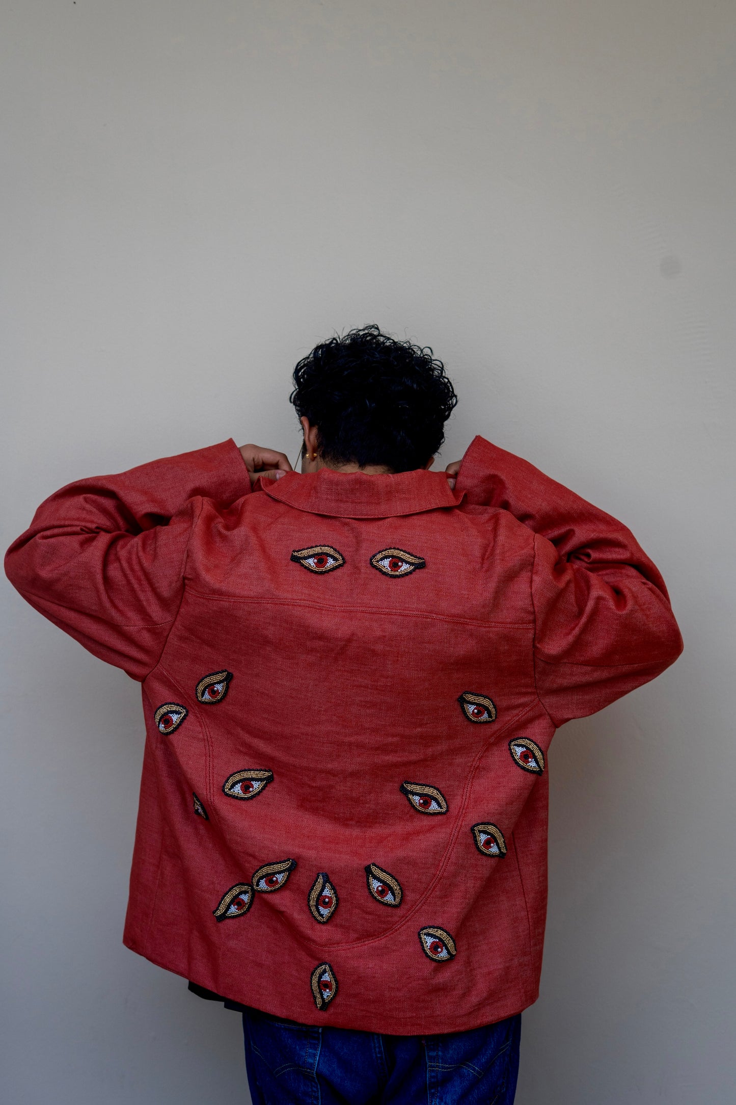 Devils watching red denim bomber